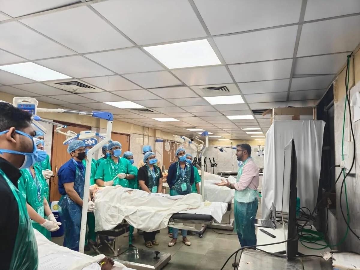 Dr Anup Srinivas teaching during a surgical procedure