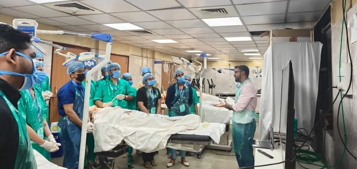 Dr Anup Srinivas teaching surgical techniques during a head and neck surgery programme